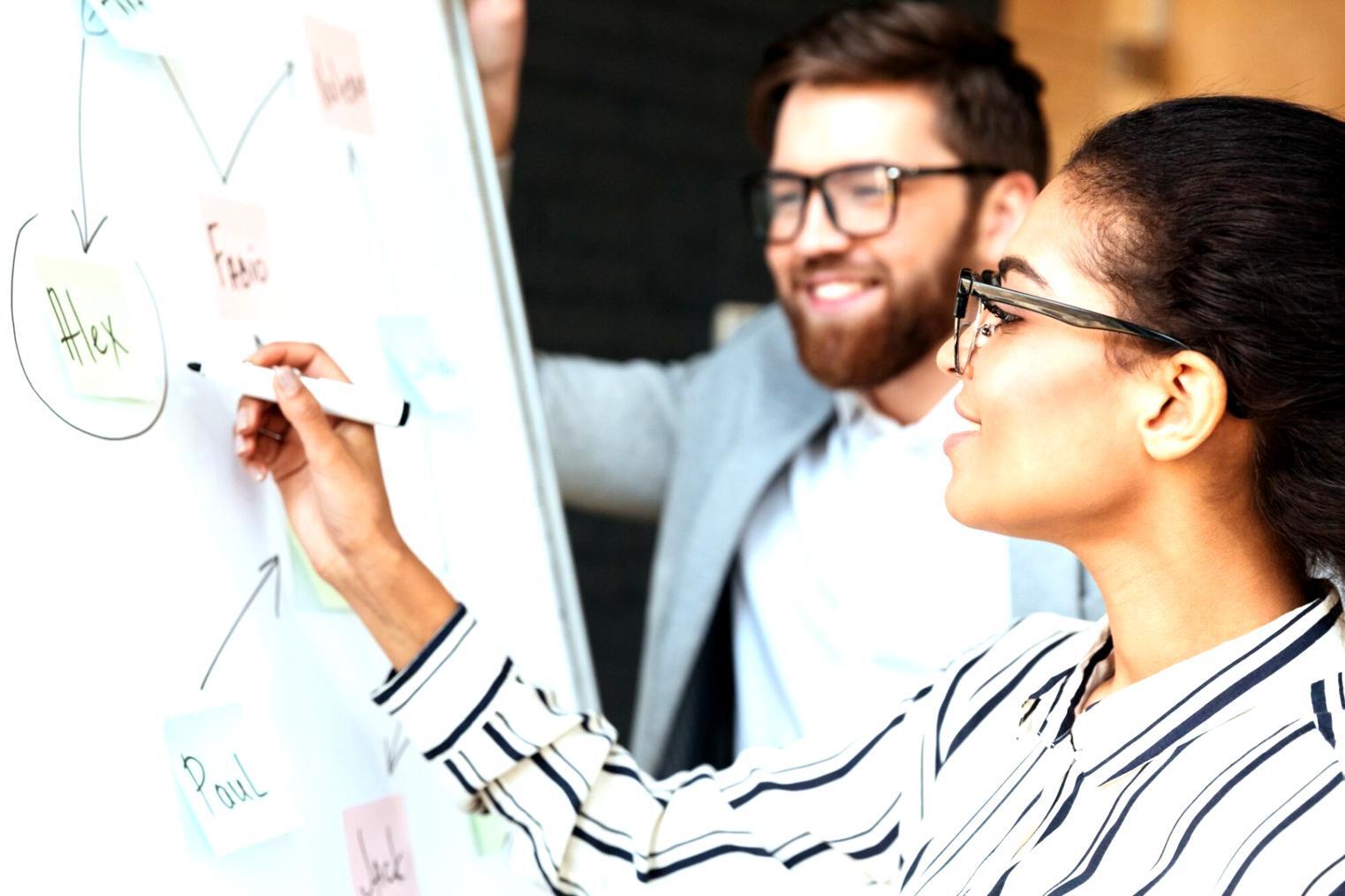 Business owner reviewing financial documents and sales forecasts